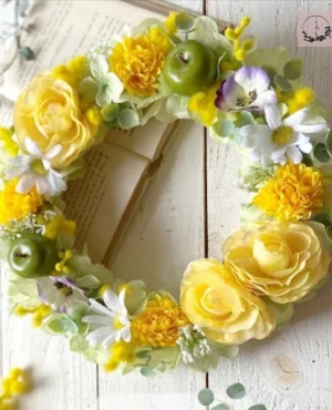 How to make a yellow artificial flower wreath
