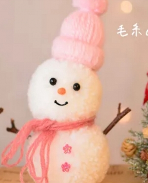 Snowman made of wool pom-poms Christmas handmade